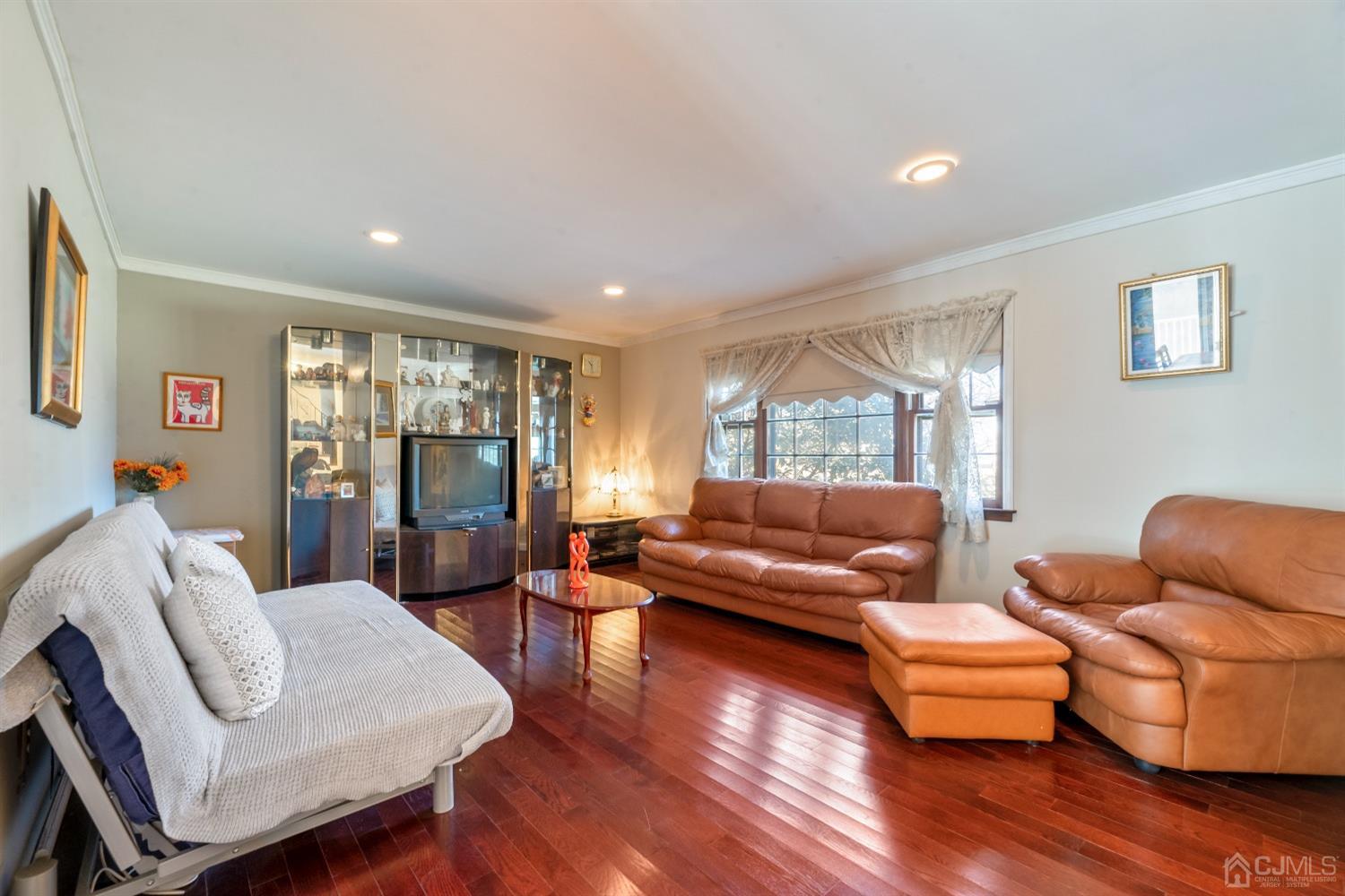 7 Prescott Road East Brunswick, NJ 08816 - Photo 8 of 30 a living room with furniture and a window