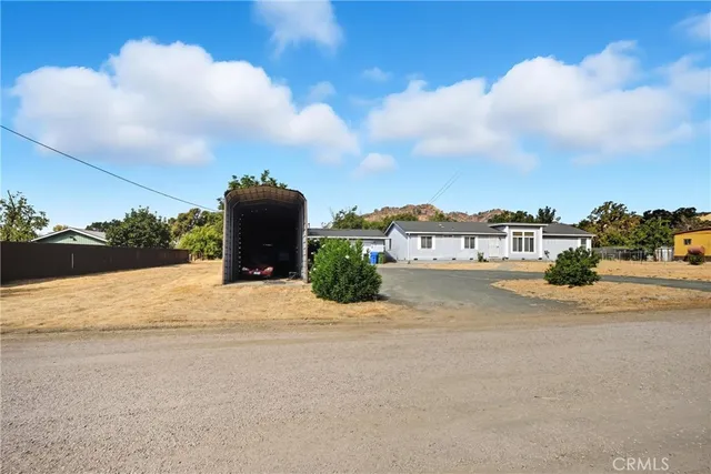 a view of swimming pool with an outdoor seating