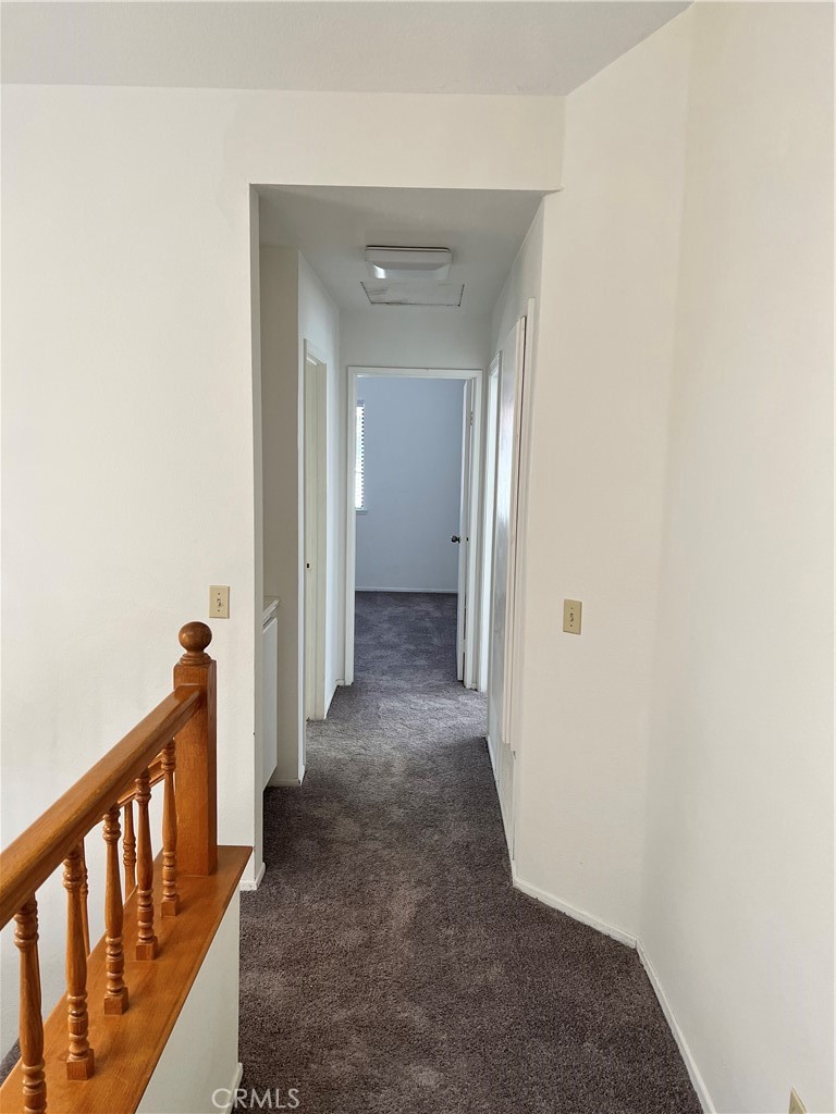1409 Bodega Way, Unit 4 Diamond Bar, CA 91765 - Photo 9 of 15 a view of a hallway with wooden floor
