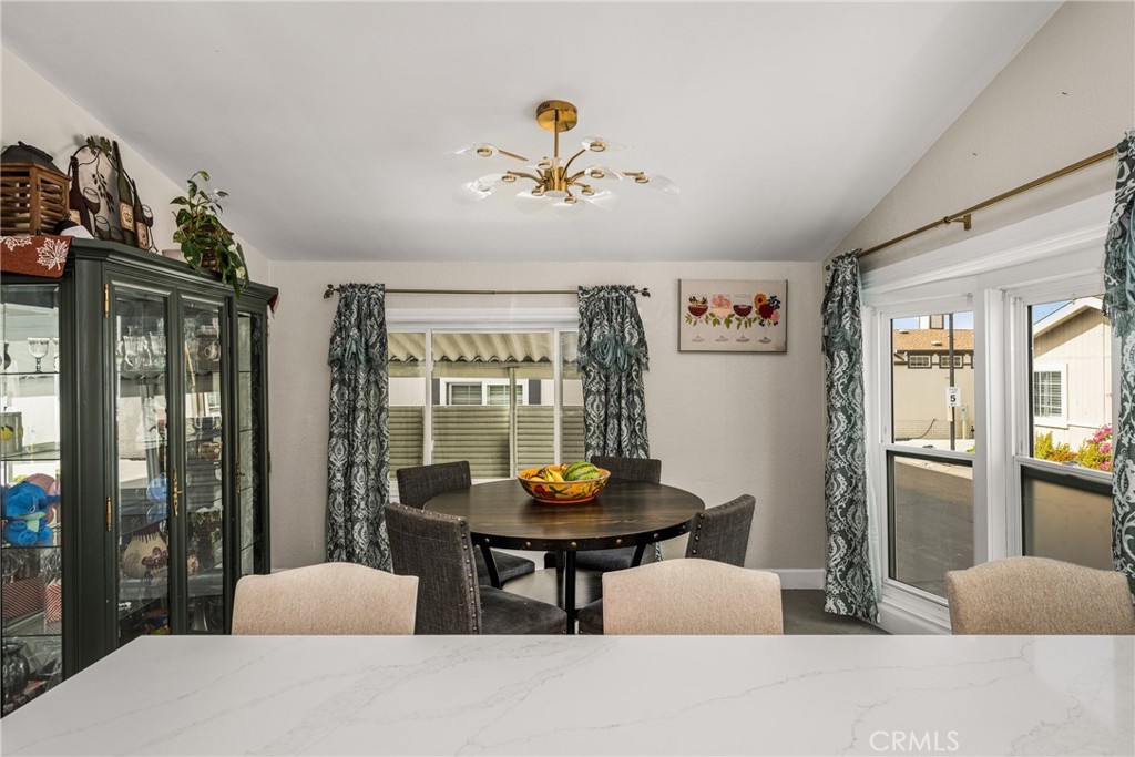 23301 Ridge Rte Drive, Unit 56 Laguna Hills, CA 92653 - Photo 17 of 44 a living room with furniture and wooden floor
