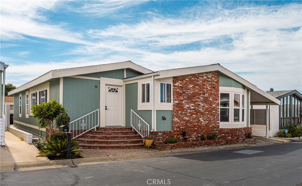 23301 Ridge Rte Drive, Unit 56 Laguna Hills, CA 92653 - Photo 2 of 44 front view of a house