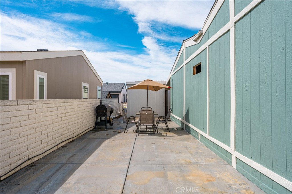 23301 Ridge Rte Drive, Unit 56 Laguna Hills, CA 92653 - Photo 33 of 44 a view of sitting area with furniture in front of house