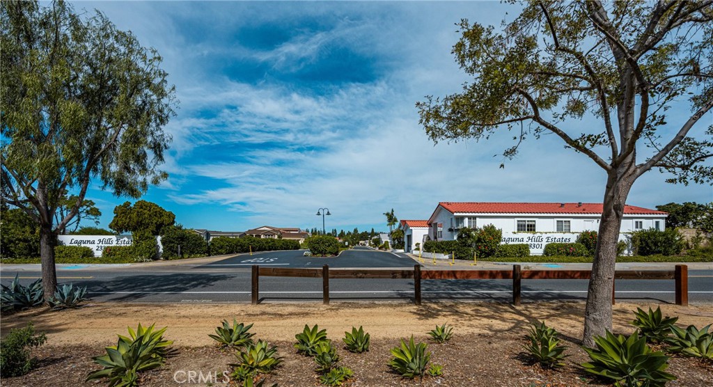 23301 Ridge Rte Drive, Unit 56 Laguna Hills, CA 92653 - Photo 43 of 44 a view of a swimming pool with a patio