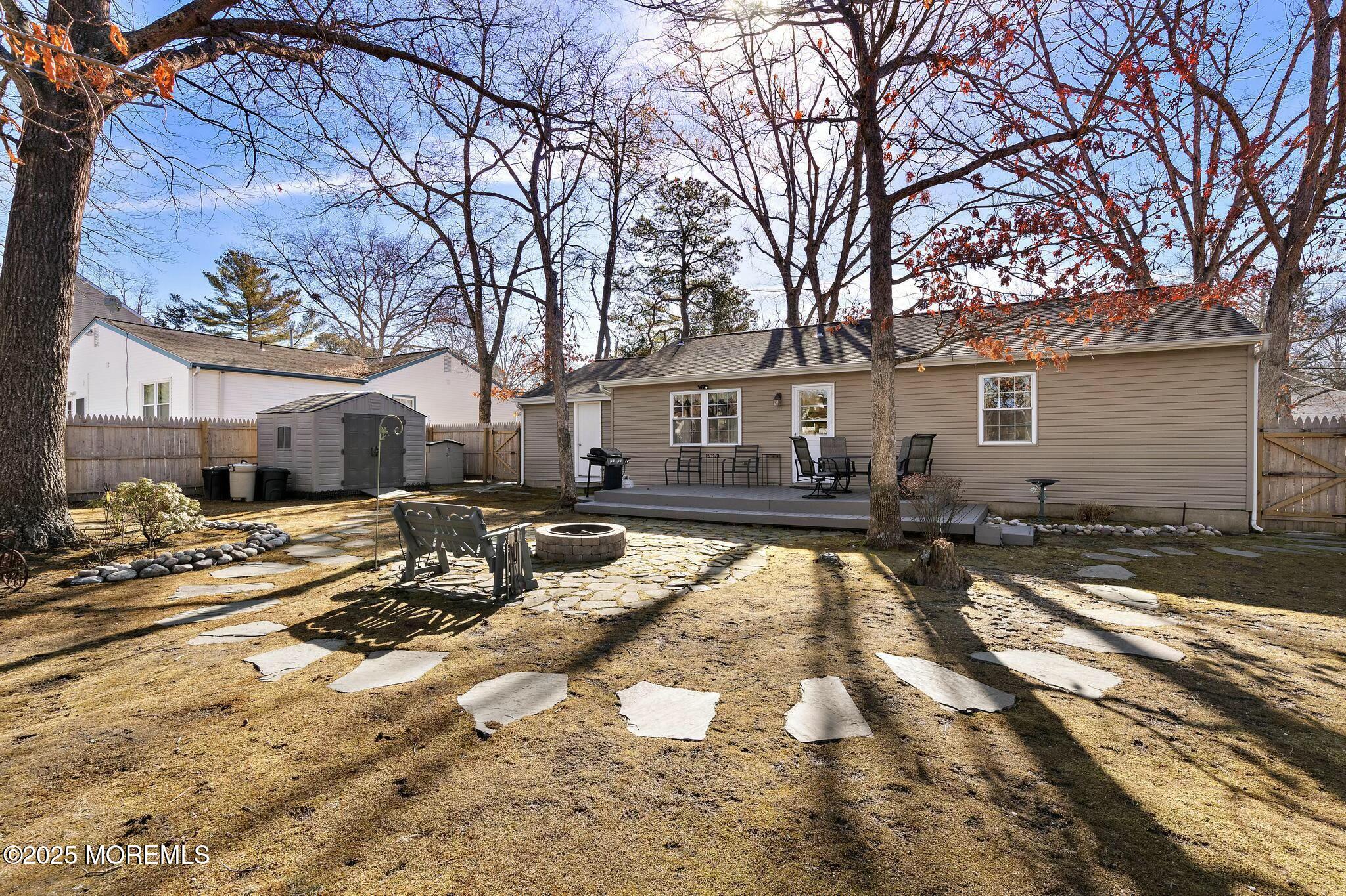 176 Riptide Avenue Manahawkin, NJ 08050 - Photo 13 of 13 a view of a house with snow on the road
