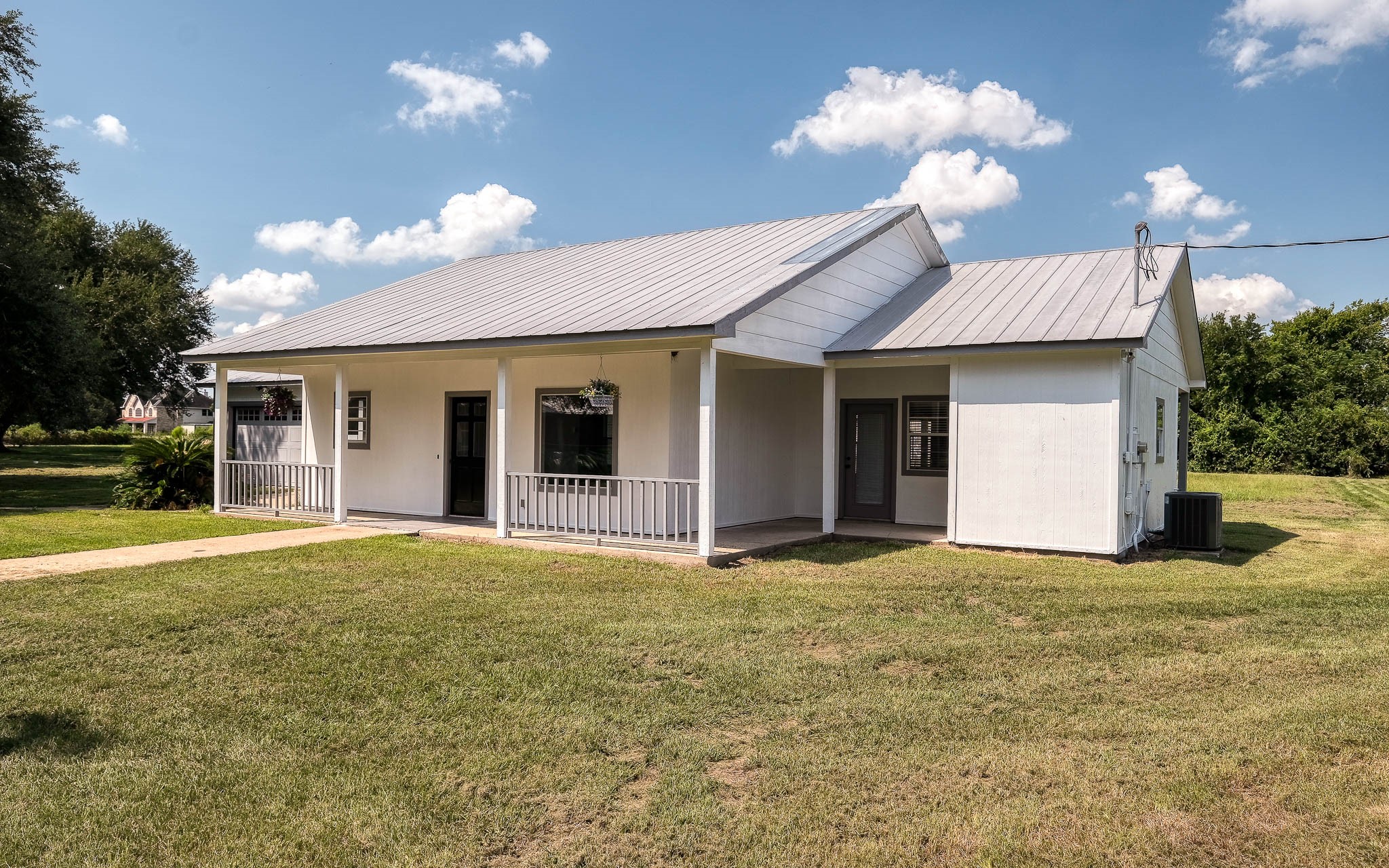 20515 Kickapoo Road Waller, TX 77484 - Photo 32 of 50 a view of a house with a yard and garage