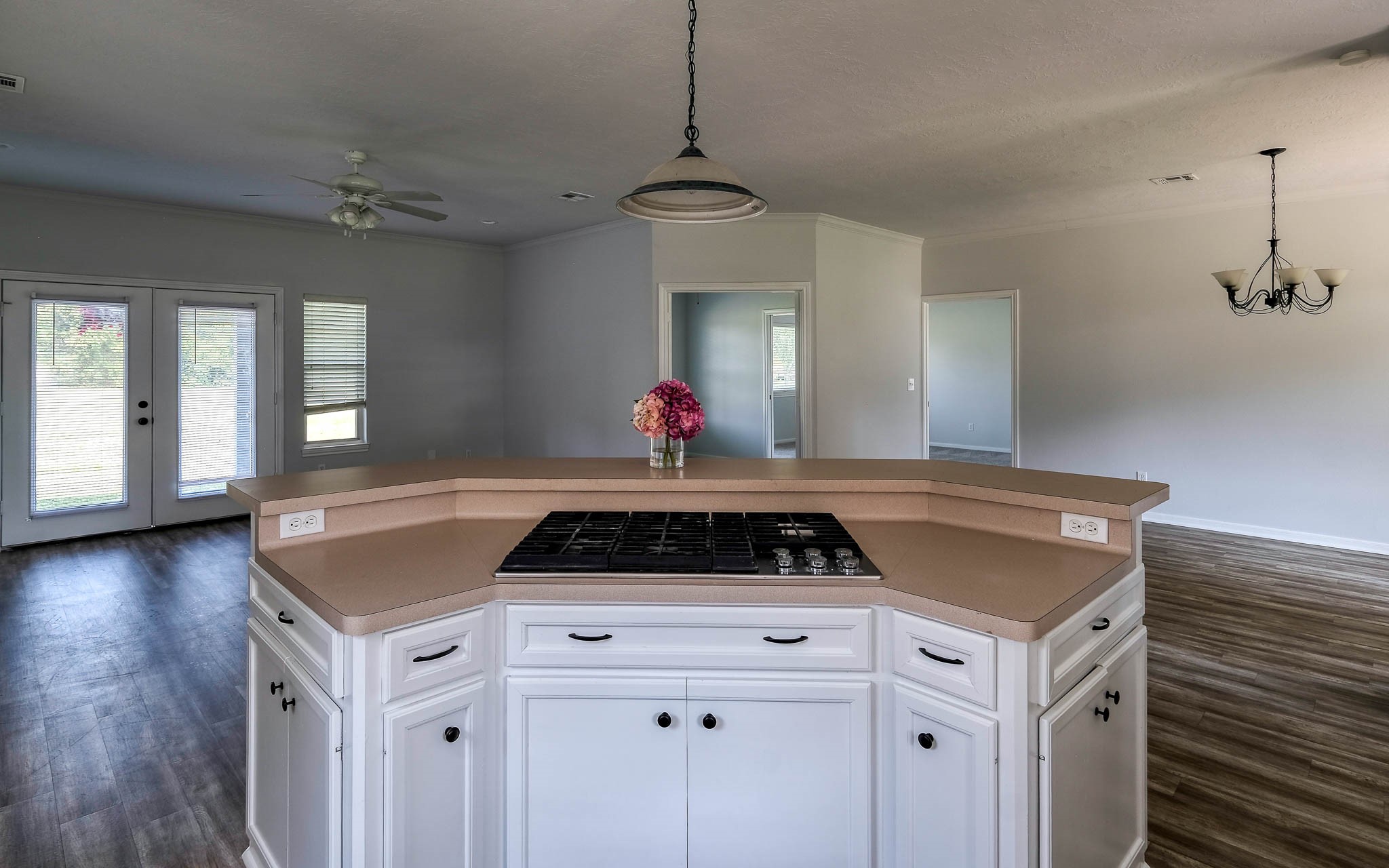 20515 Kickapoo Road Waller, TX 77484 - Photo 36 of 50 a kitchen with a stove and white cabinets