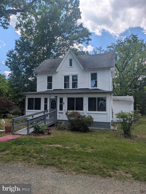 7315 Oxon Hill Road Oxon Hill, MD 20745 - Photo 1 of 12 a house view with a garden space