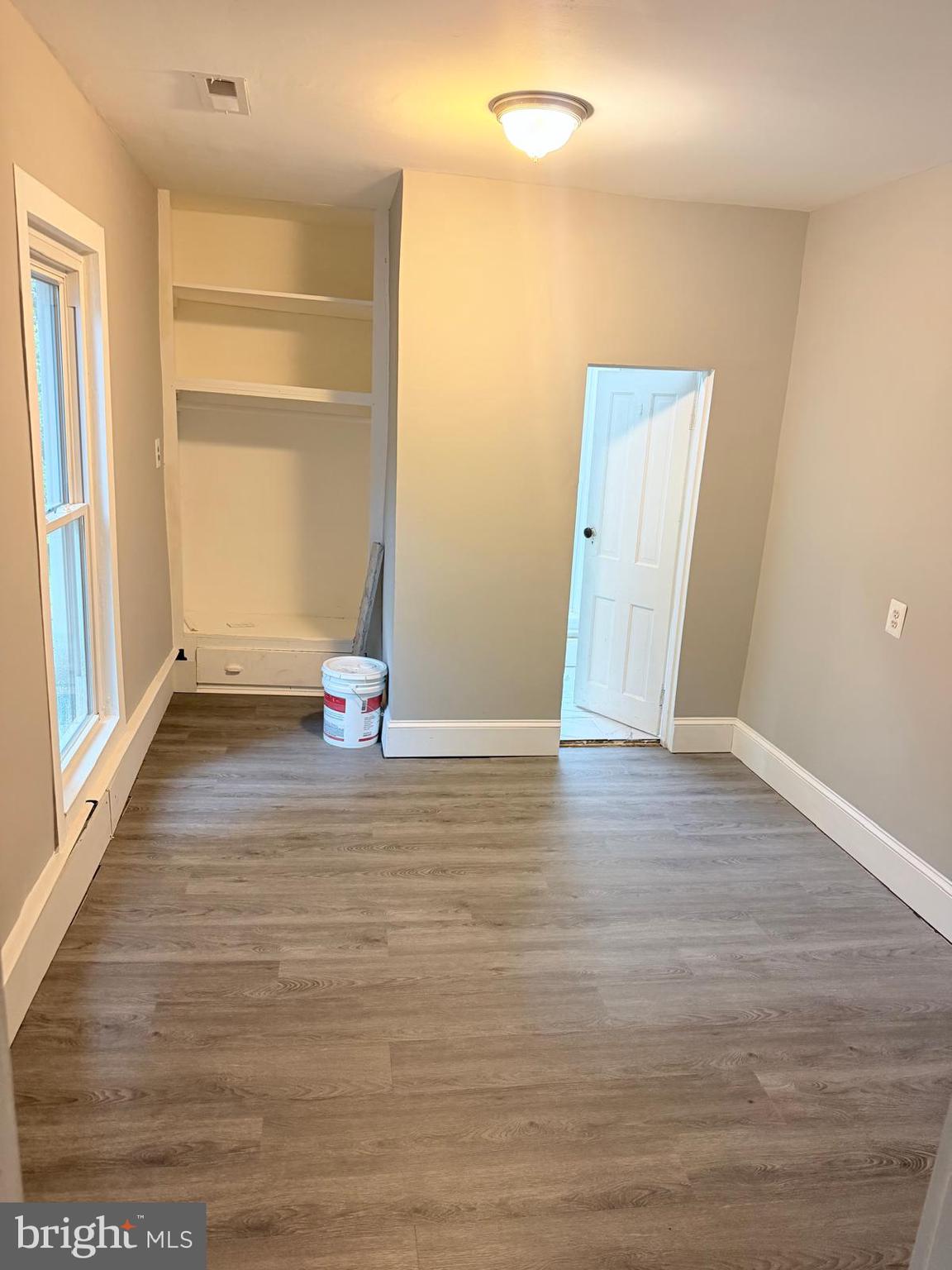 7315 Oxon Hill Road Oxon Hill, MD 20745 - Photo 11 of 12 a view of empty room with wooden floor