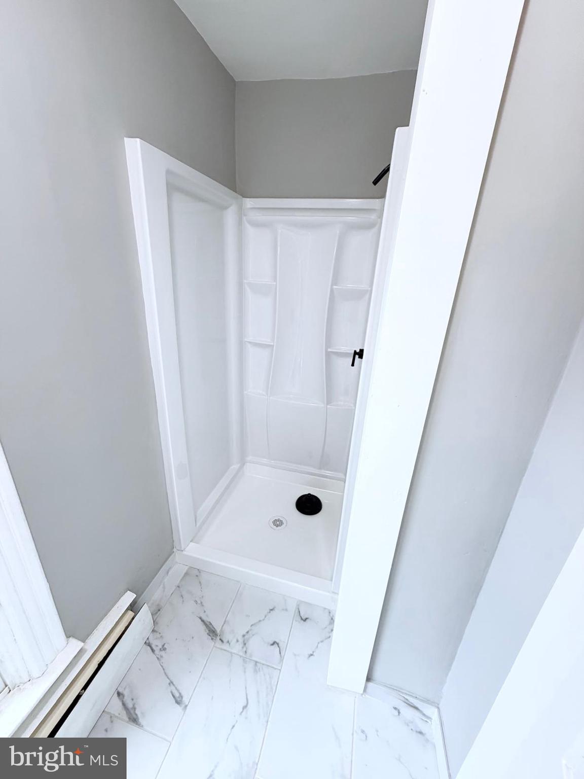 7315 Oxon Hill Road Oxon Hill, MD 20745 - Photo 8 of 12 a bathroom with a shower
