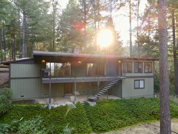 front view of a house with a garden