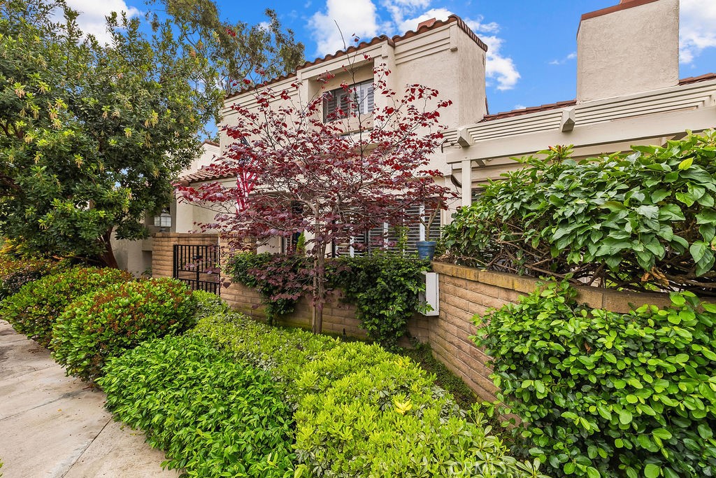 a backyard of a building with lots of green space
