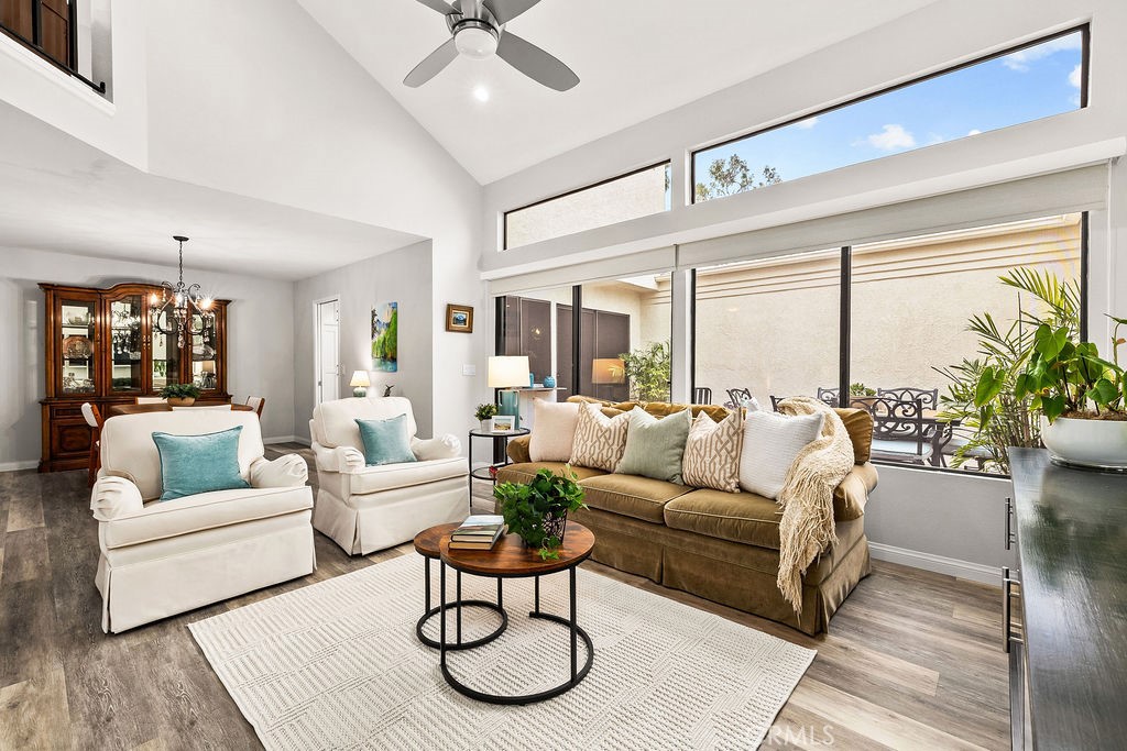 38 Navarre, Unit 138 Irvine, CA 92612 - Photo 11 of 33 a living room with furniture and a large window