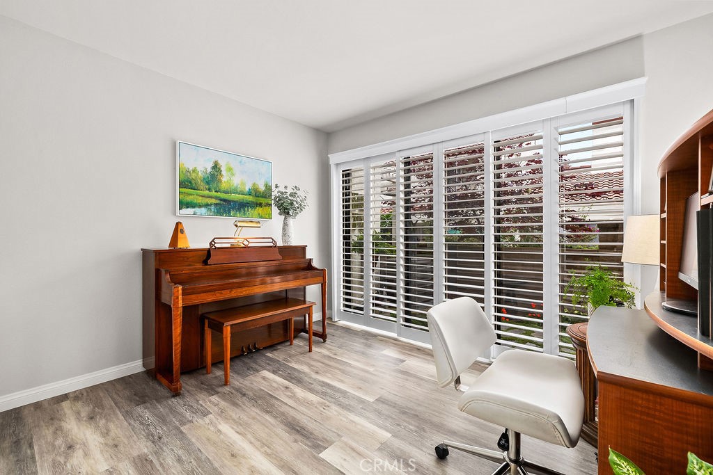 38 Navarre, Unit 138 Irvine, CA 92612 - Photo 20 of 33 a work room with furniture and a flat screen tv