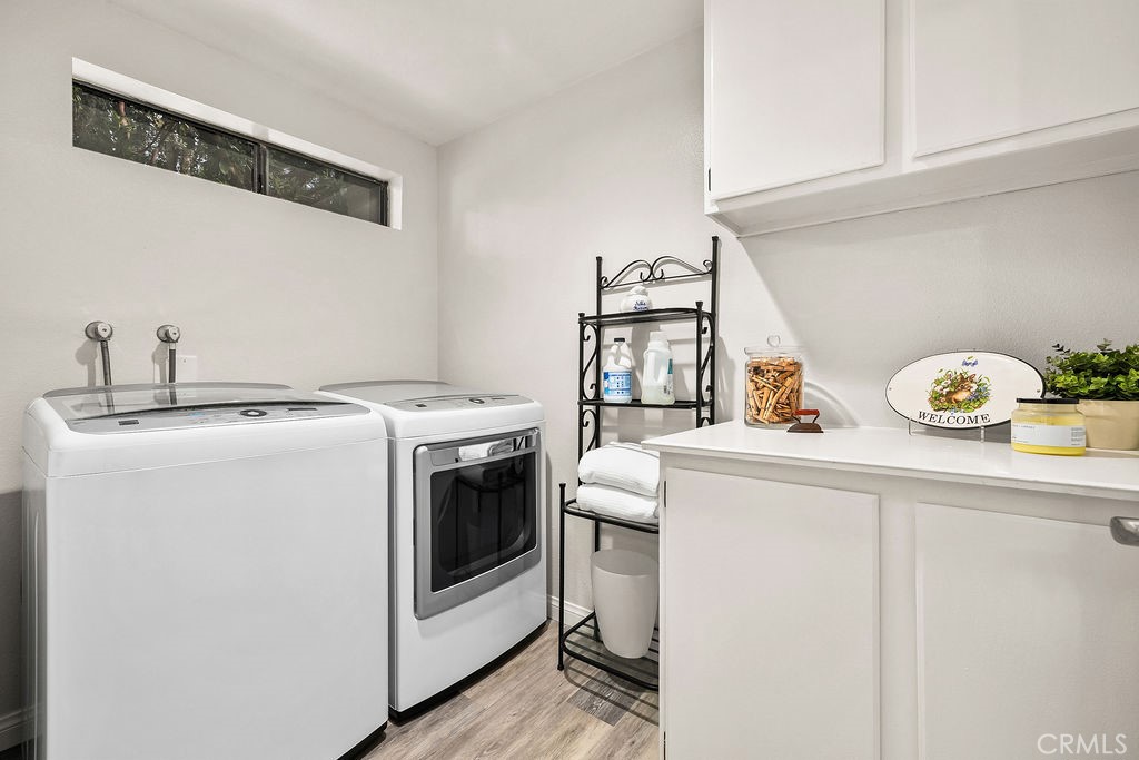 38 Navarre, Unit 138 Irvine, CA 92612 - Photo 23 of 33 a utility room with dryer and washer