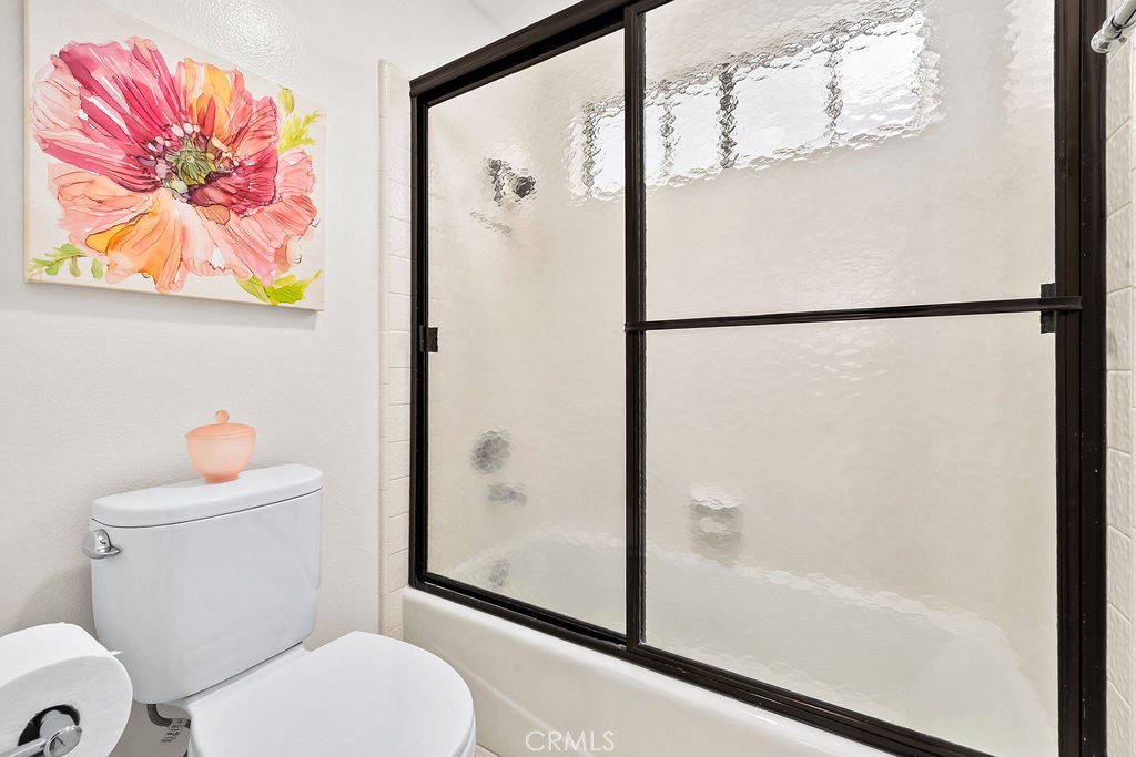 38 Navarre, Unit 138 Irvine, CA 92612 - Photo 27 of 33 a white toilet sitting next to a bathroom sink