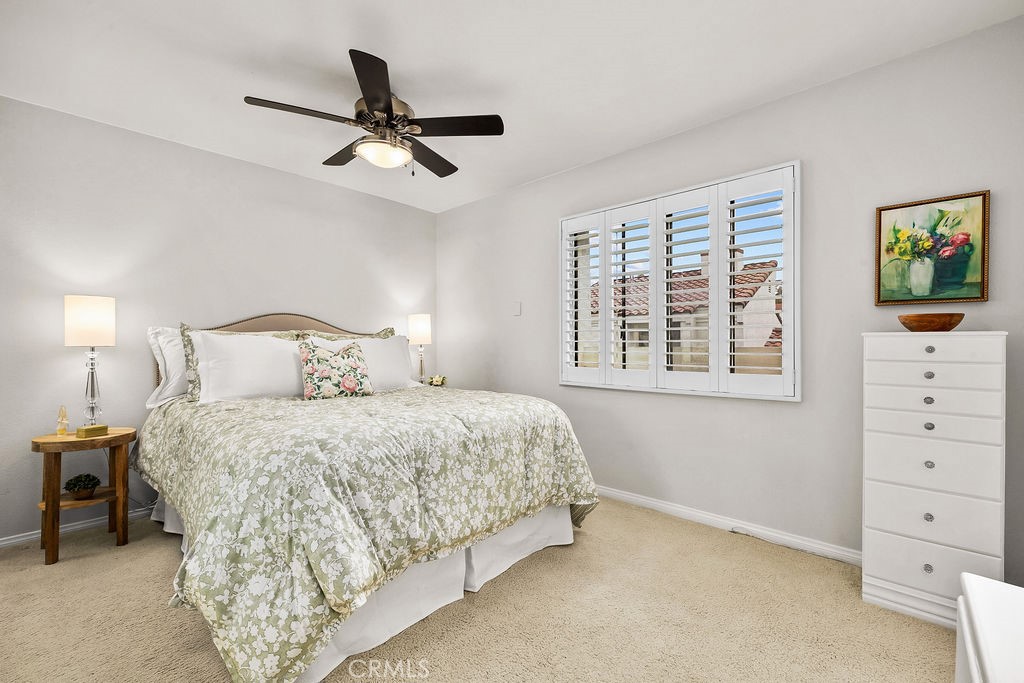 38 Navarre, Unit 138 Irvine, CA 92612 - Photo 28 of 33 a bedroom with a bed and a window
