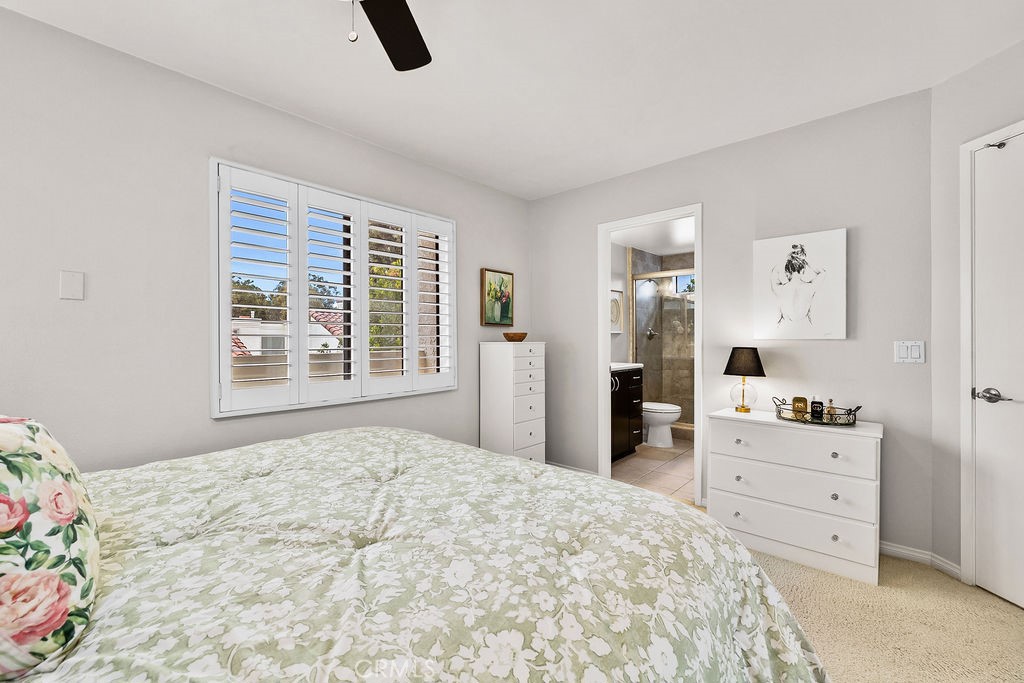 38 Navarre, Unit 138 Irvine, CA 92612 - Photo 29 of 33 a bedroom with a bed and a dresser