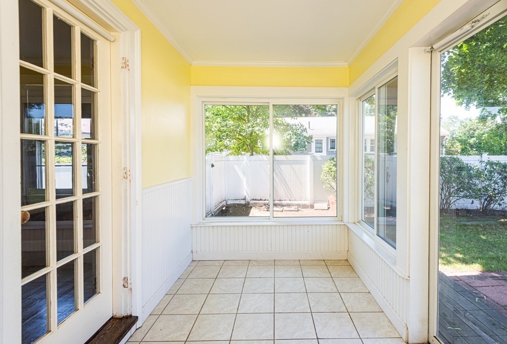 81 Fairview Avenue Lynnfield, MA 01940 - Photo 12 of 41 a kitchen with a sink a wooden floor and a large window