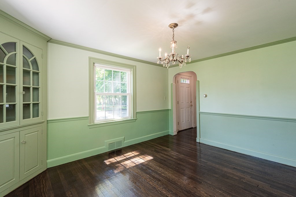 81 Fairview Avenue Lynnfield, MA 01940 - Photo 15 of 41 a view of an empty room with wooden floor and a window