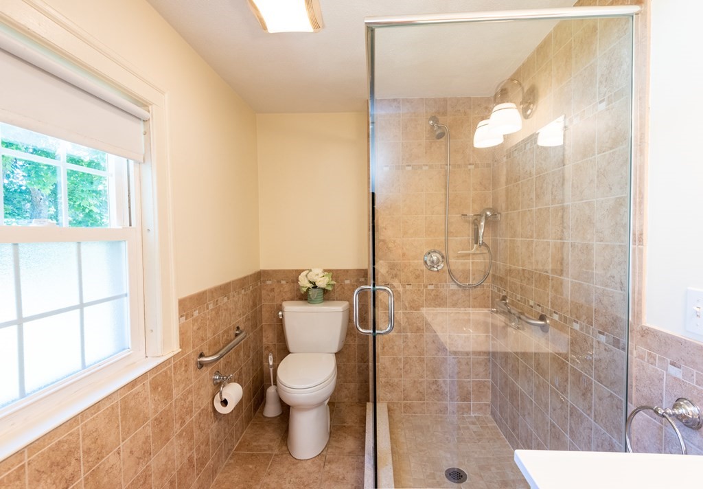 81 Fairview Avenue Lynnfield, MA 01940 - Photo 34 of 41 a bathroom with a toilet a sink and bath tub
