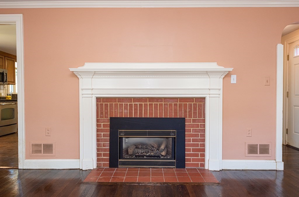 81 Fairview Avenue Lynnfield, MA 01940 - Photo 7 of 41 a living room with a fireplace