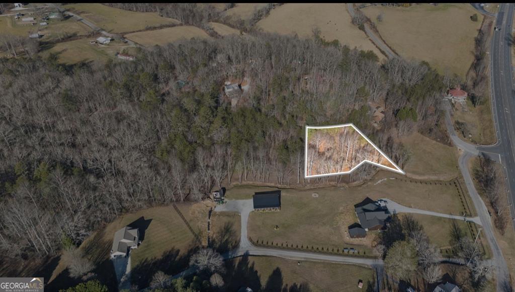 Lot 29 Ideal Acres Road Otto, NC 28763 - Photo 12 of 12 an aerial view of a house with a yard