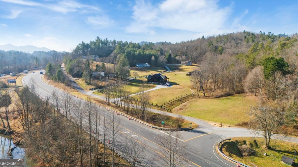 Lot 29 Ideal Acres Road Otto, NC 28763 - Photo 7 of 12 a view of a swimming pool with a yard