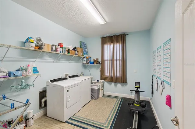 a gym room with furniture