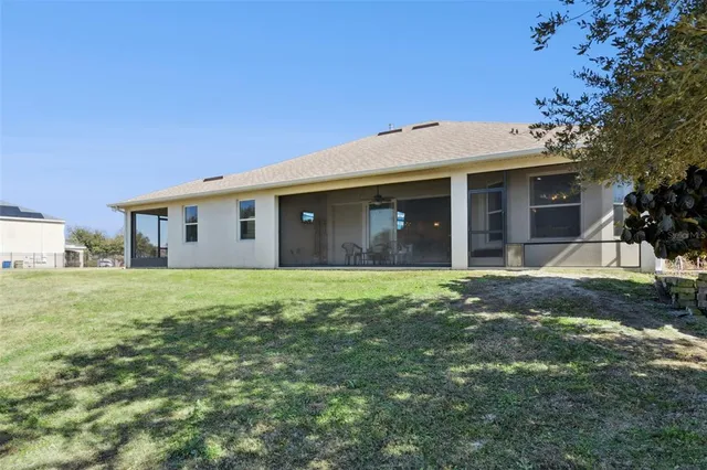 an aerial view of residential building with outdoor space