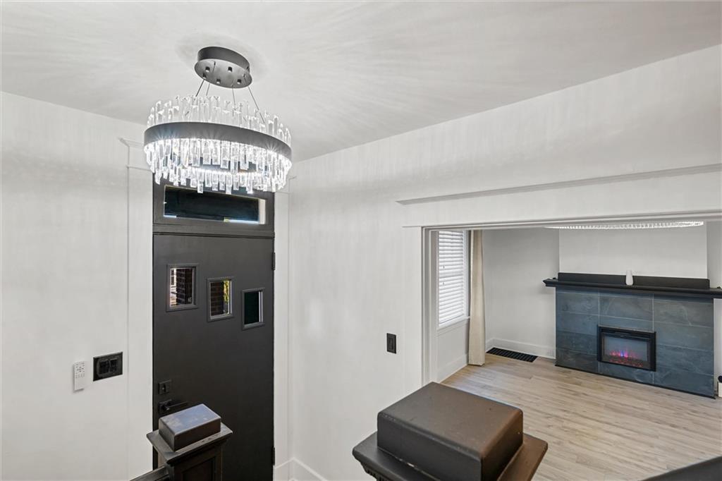 56 Bascom Avenue Pittsburgh, PA 15214 - Photo 23 of 46 a view of a livingroom with a fireplace