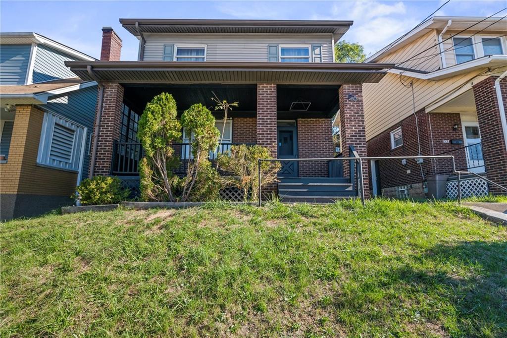 56 Bascom Avenue Pittsburgh, PA 15214 - Photo 30 of 46 front view of a house with a yard