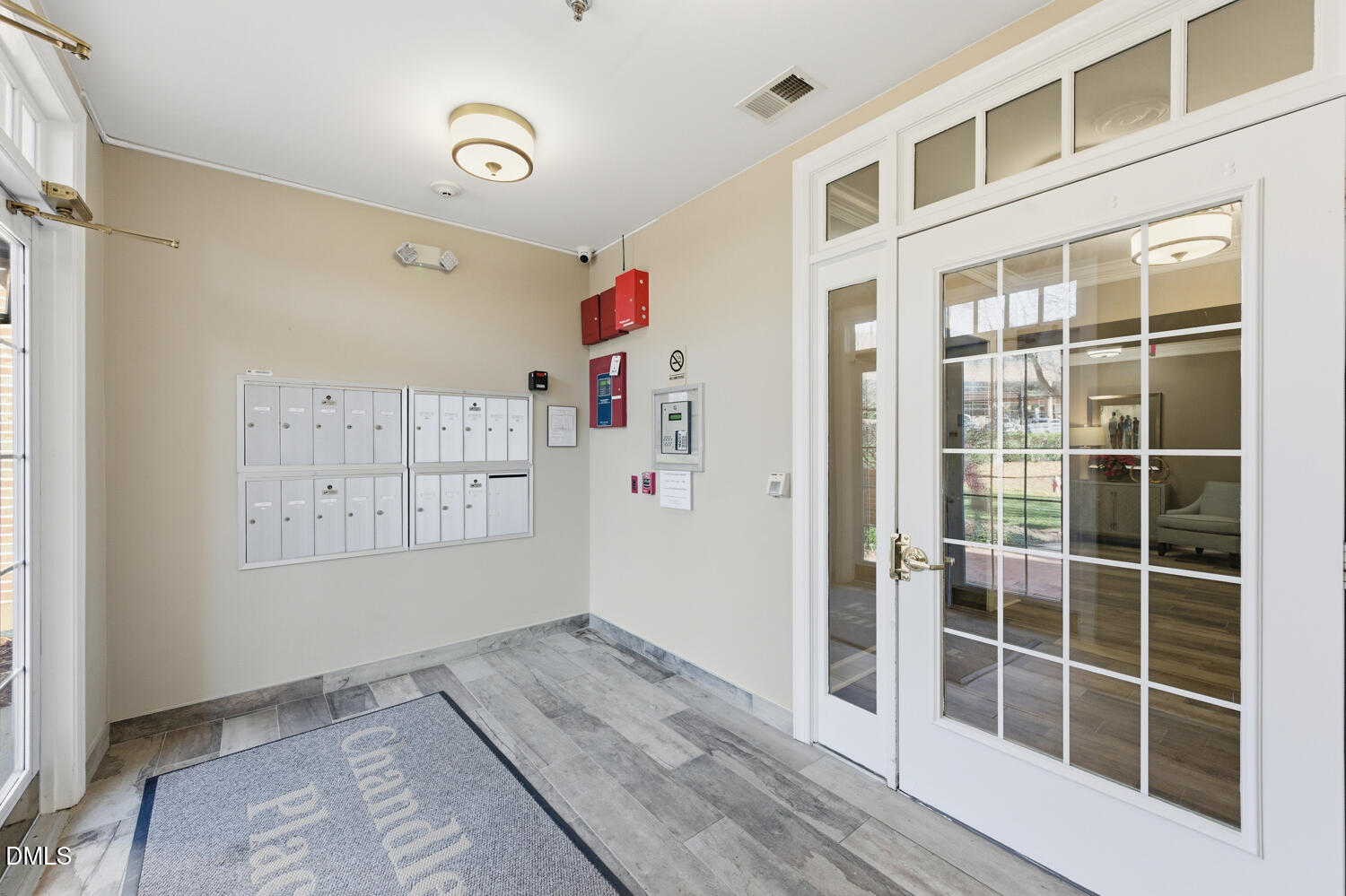 116 Northbrook Drive, Unit 204 Raleigh, NC 27609 - Photo 50 of 94 a view of an empty room with wooden floor and a window