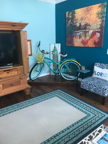 a view of staircase with white walls and windows
