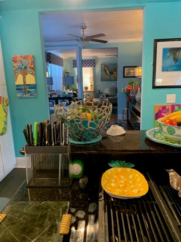 a front view of a house with a yard table and chairs