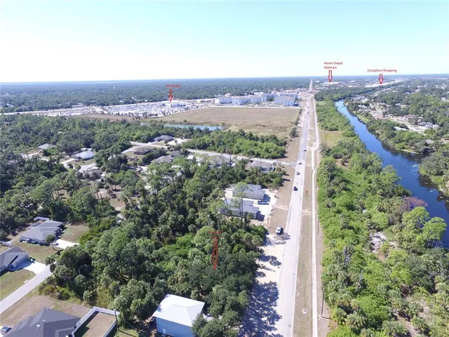 an aerial view of house with yard