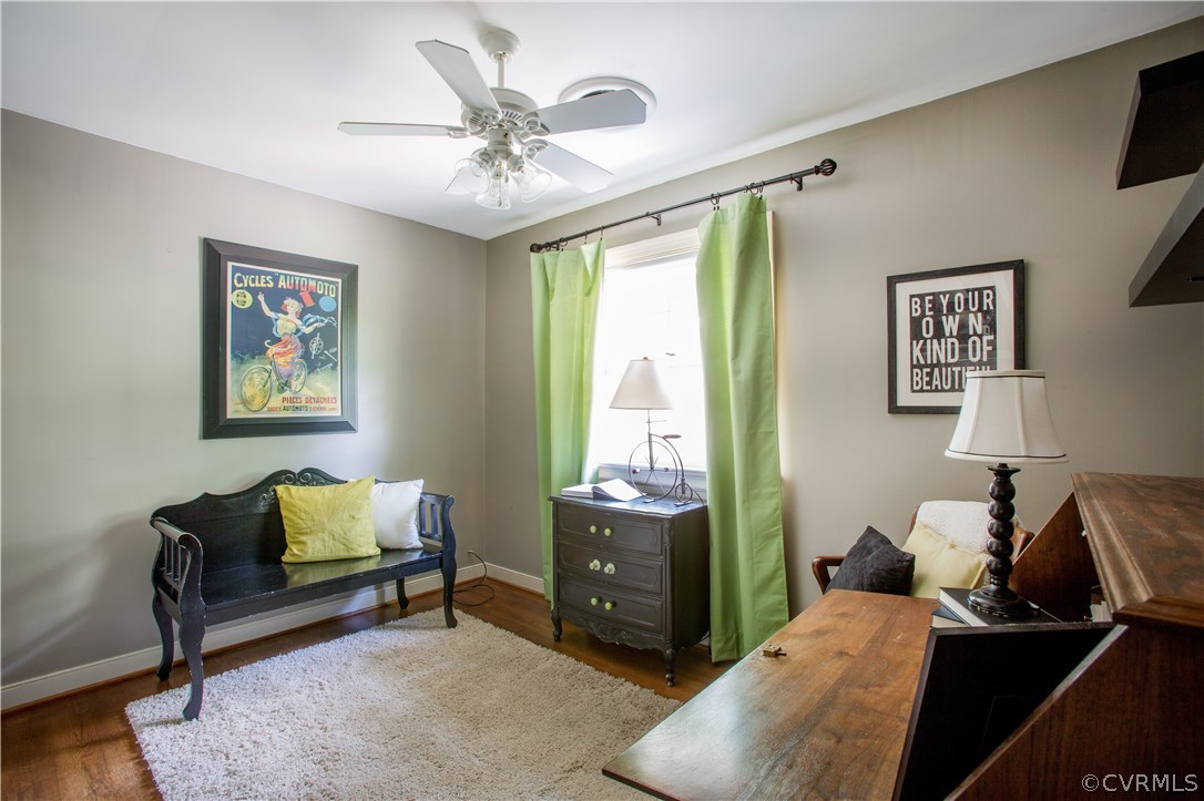10301 Apache Road Richmond, VA 23235 - Photo 17 of 24 a bedroom with a bed and a chandelier