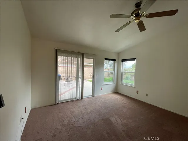 a kitchen with a sink and stainless steel appliances