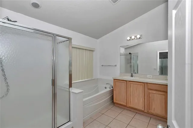 a bathroom with a bathtub and a sink