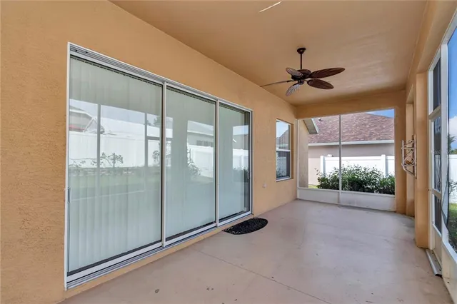 a view of an empty room with a balcony