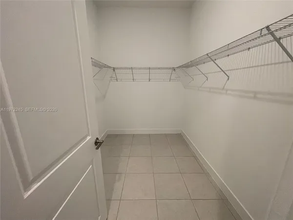 a view of a room with racks on the wall