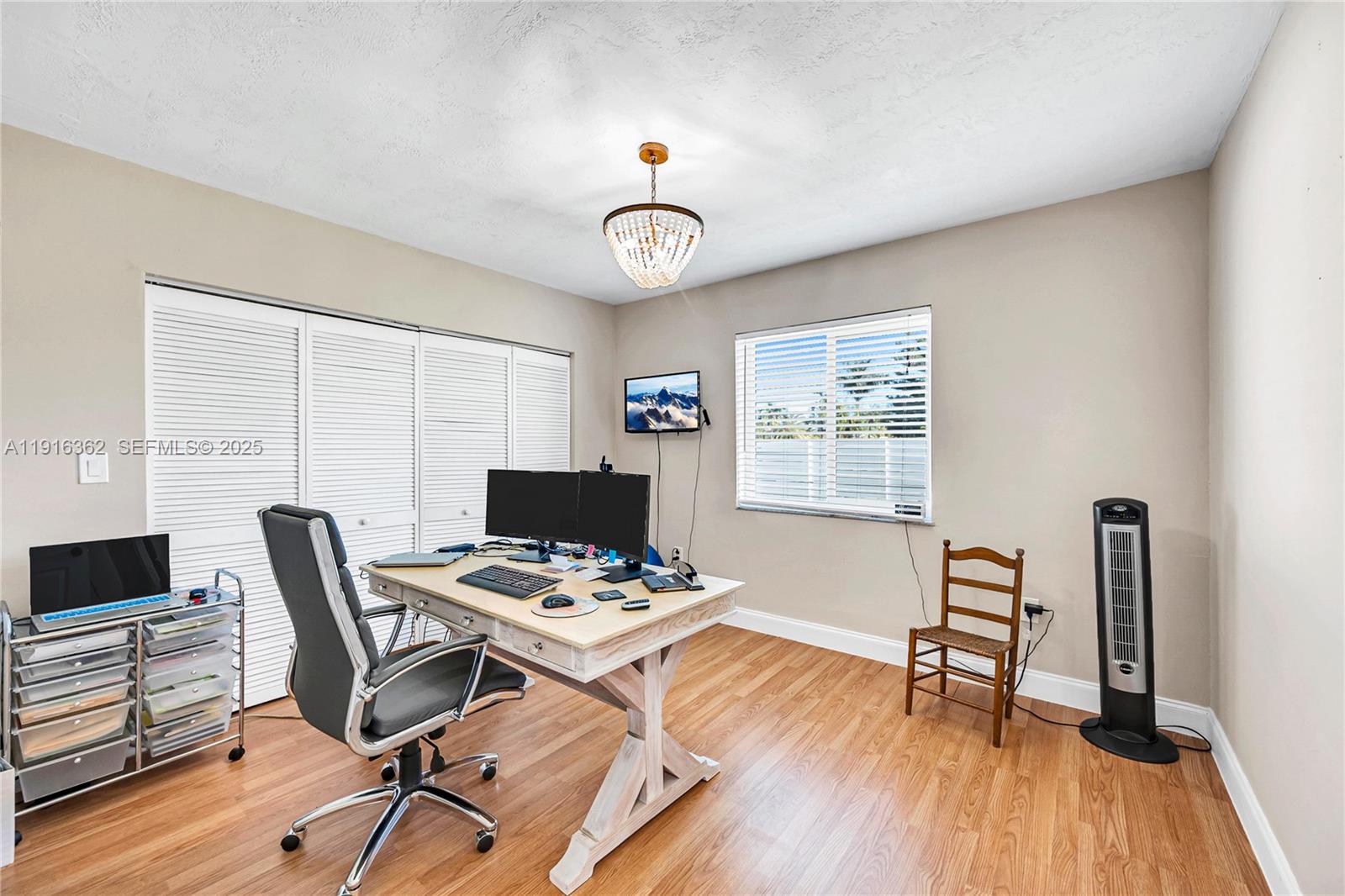 10700 Southwest 139th Road Miami, FL 33176 - Photo 38 of 68 a workspace with furniture hardwood and a window