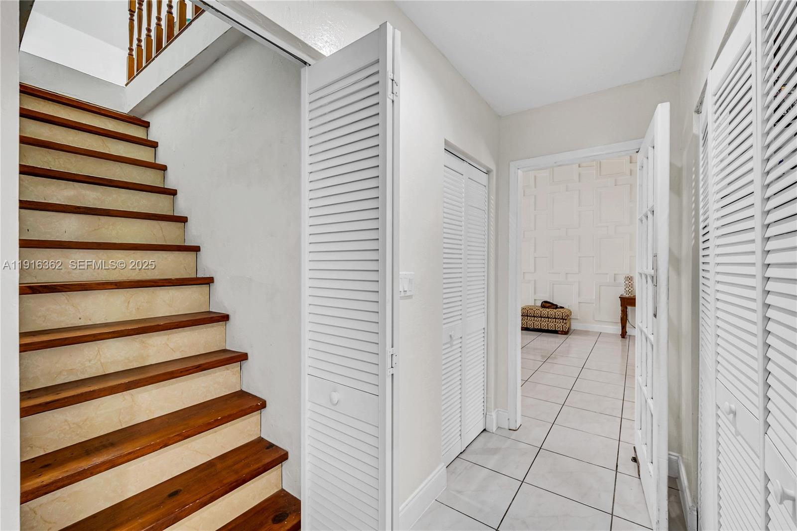 10700 Southwest 139th Road Miami, FL 33176 - Photo 56 of 68 a view of a bedroom with a closet