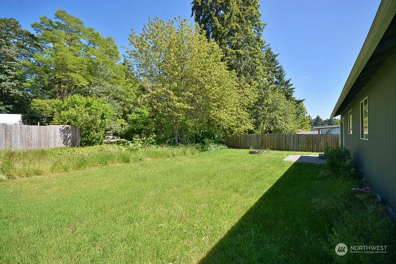 10306 3rd Street Southeast Yelm, WA 98597 - Photo 20 of 21 a view of yard with green space