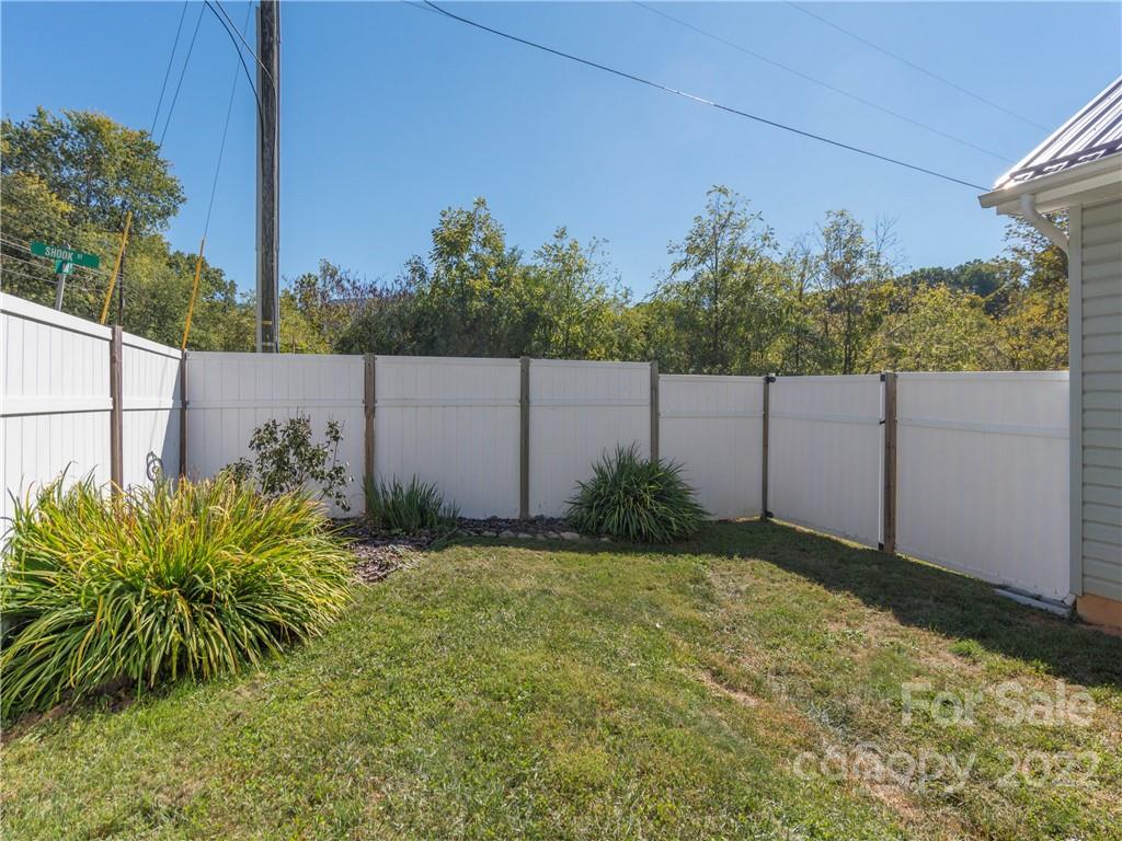 16 Village Street Clyde, NC 28721 - Photo 18 of 21 a view of a backyard