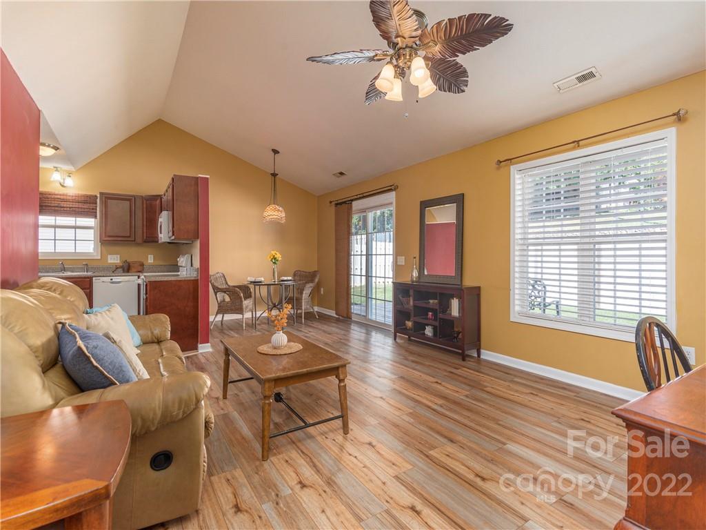 16 Village Street Clyde, NC 28721 - Photo 4 of 21 a living room with furniture and a large window