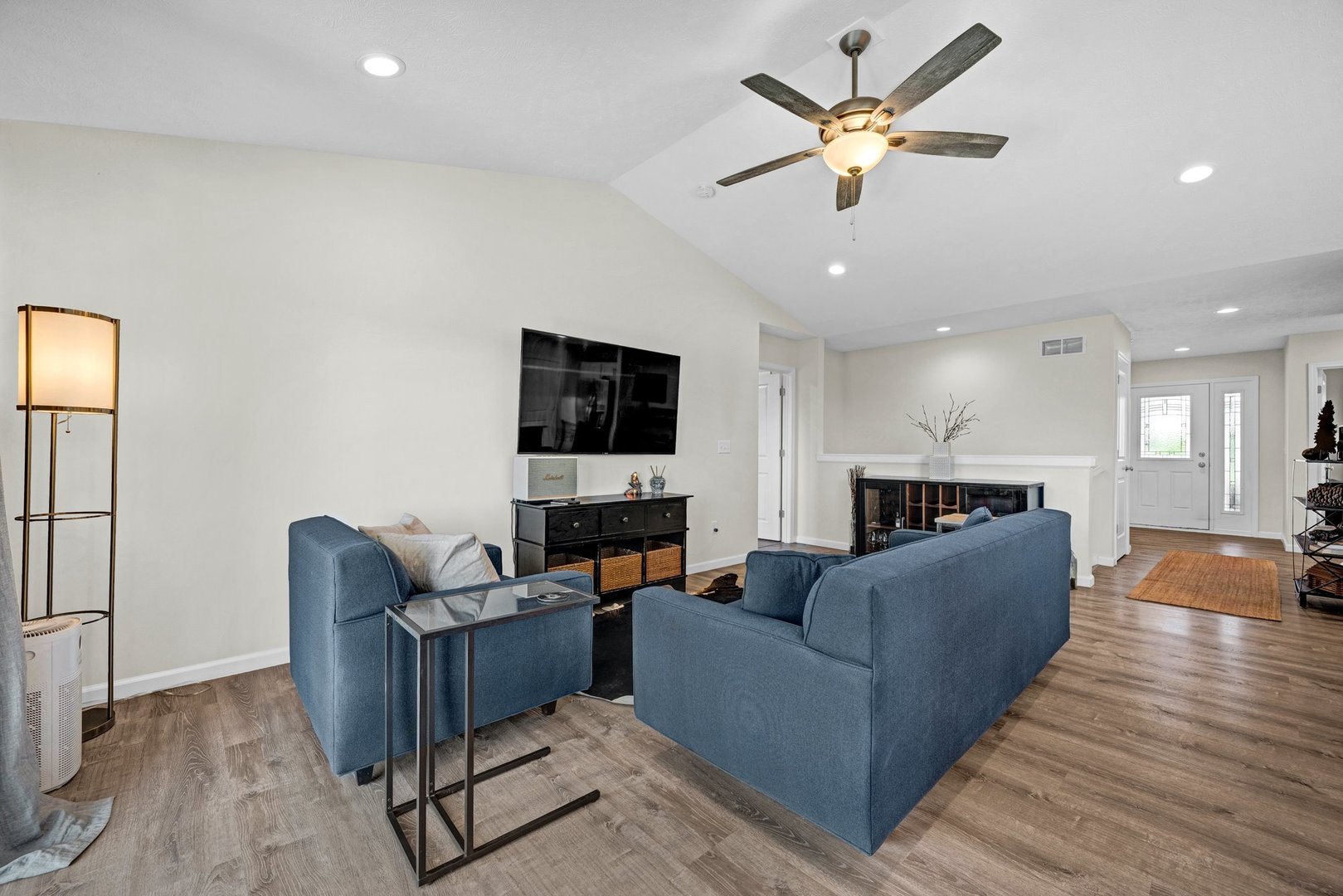 277 Cassidy Road Normal, IL 61761 - Photo 6 of 42 a living room with furniture and a ceiling fan