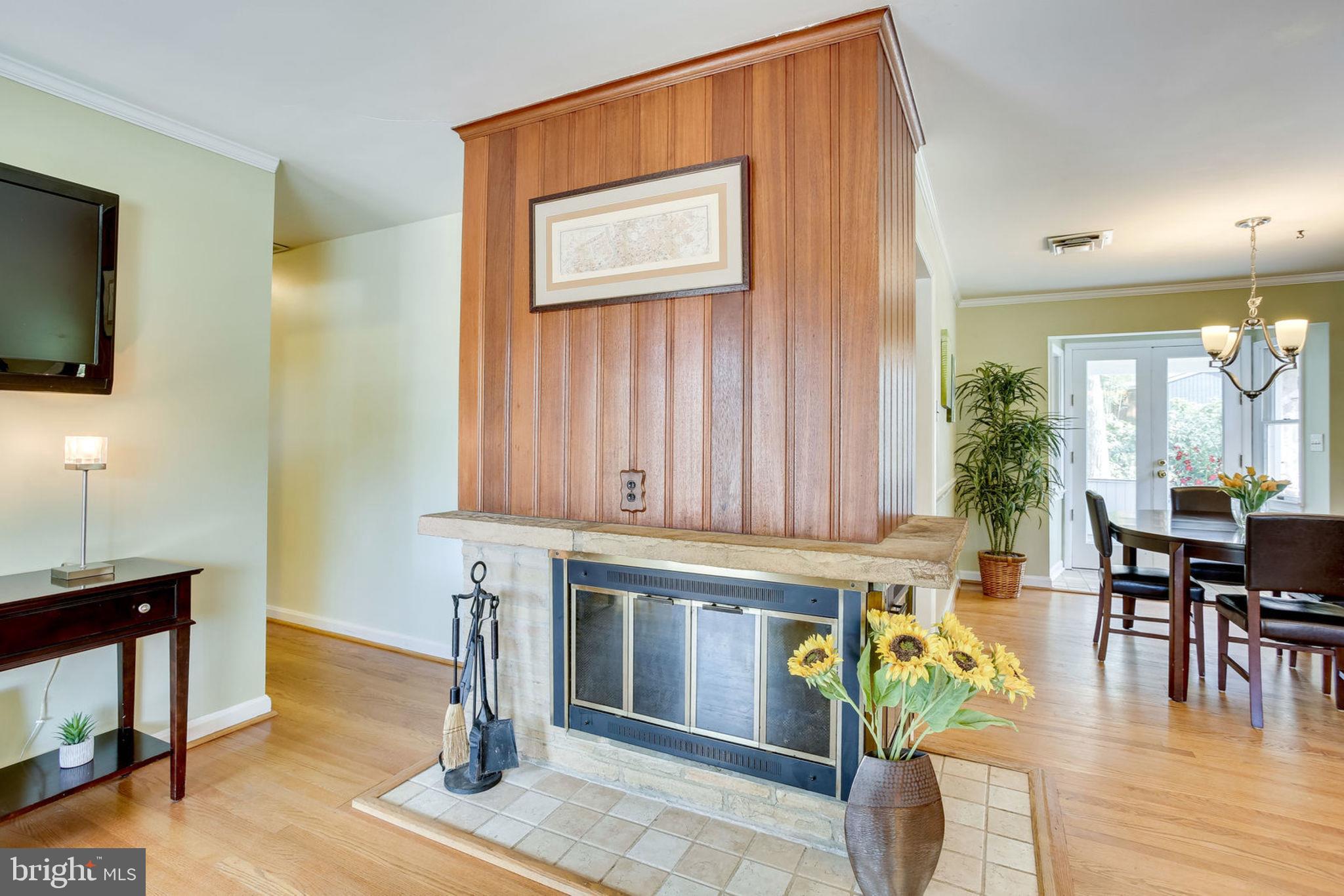 Living room with cozy corner WB fireplace