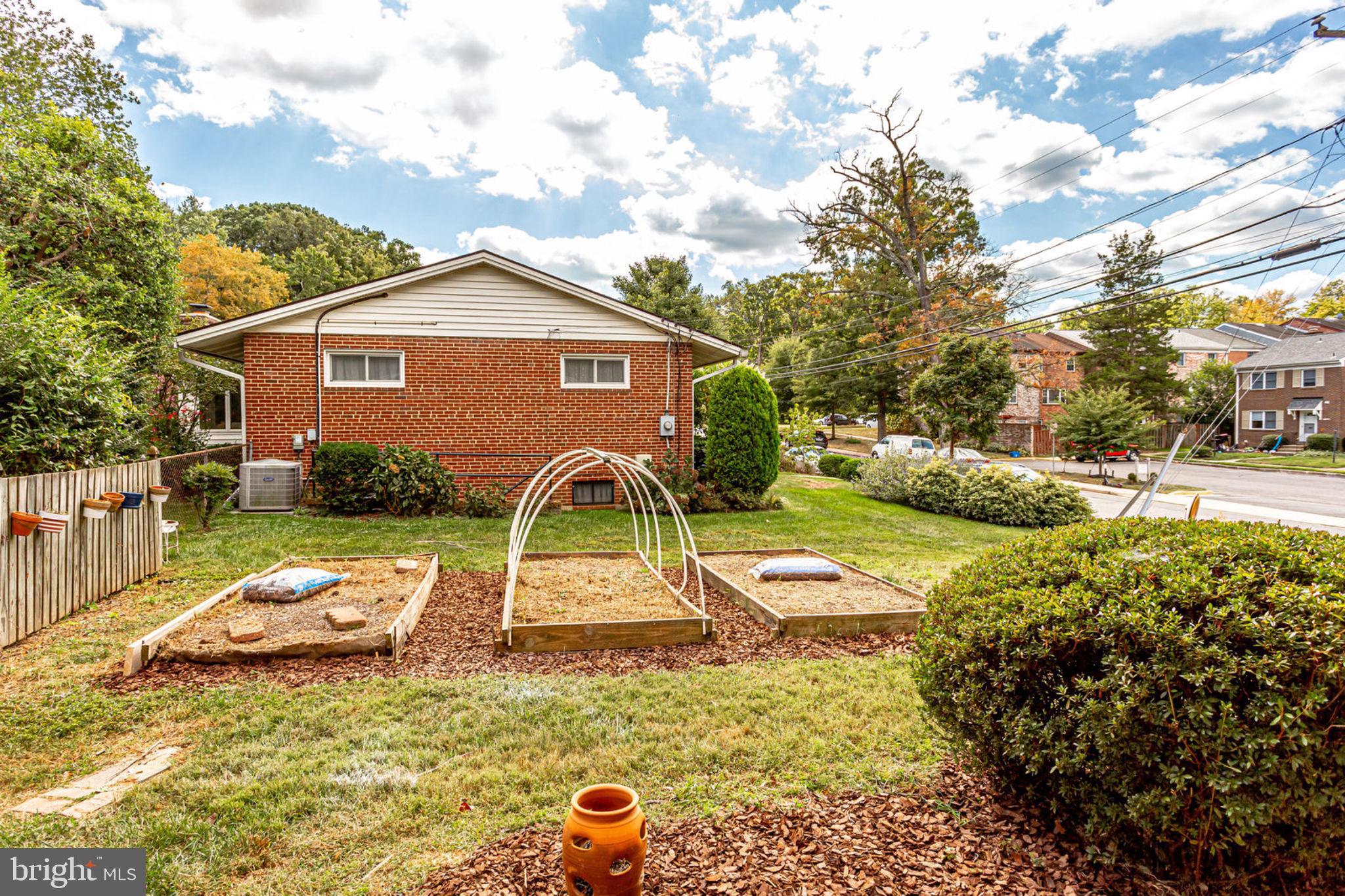 4103 Sideburn Road Fairfax, VA 22030 - Photo 45 of 54 Side yard with above ground garden area