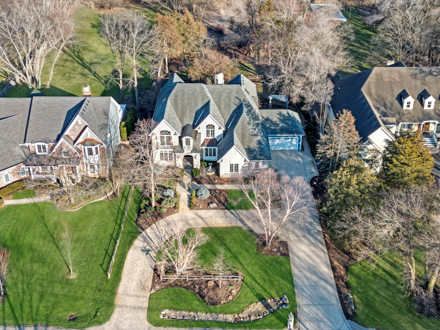 an aerial view of multiple houses with outdoor space