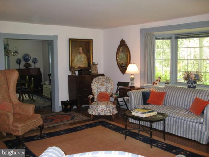 11811 Ridgemont Road Lutherville-Timonium, MD 21093 - Photo 2 of 17 a living room with furniture and a large window